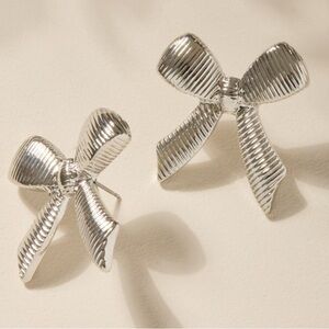 Francesca’s Martha Ribbed Bow Detail Silver Colored Stud Earrings